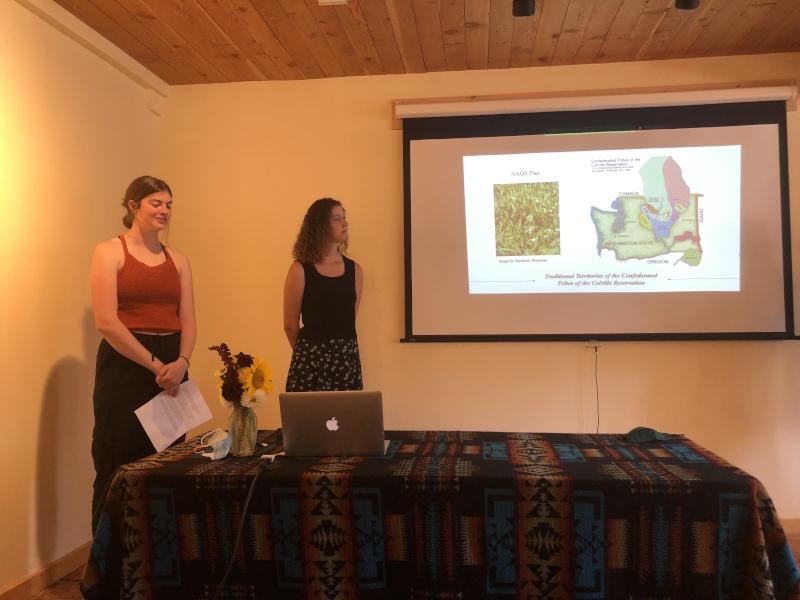 Students Julia Downing and Olivia Taylor-Manning present on pollinators in the area